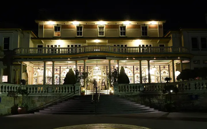 The Carrington lit up at night