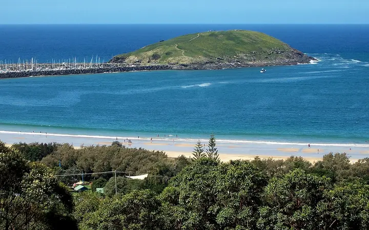 Muttonbird Island at the end of the breakwall