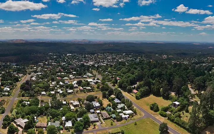 Wombat Hill's gardens and the view across the region