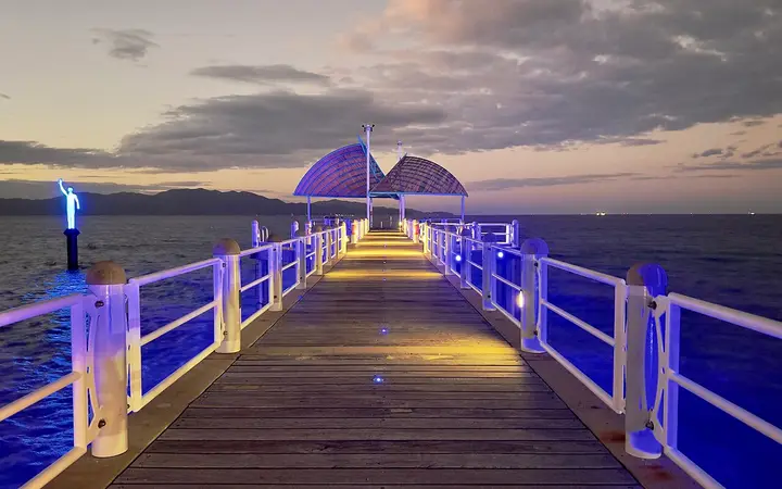 The Strand jetty at dusk, beside Strand Park where the markets run