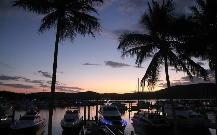 Hamilton Island marina at dusk, where the dinner cruise boards
