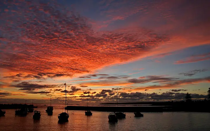 Dawn over the boat harbour at Shellharbour