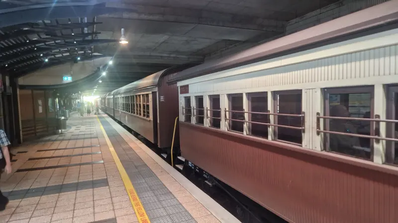 Heritage carriages at the platform in Cairns station