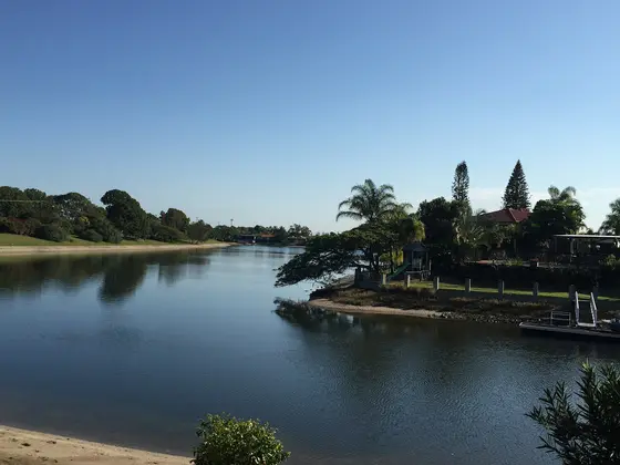 A typical canal of the suburban suburb of Mermaid Waters.