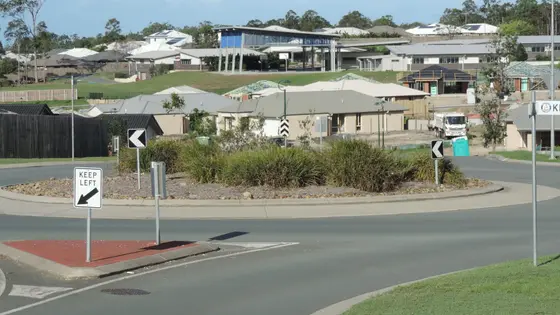Looking from Jasmine Crescent across new housing developments towards the Mother Teresa Catholic Primary School, Ormeau, 2014