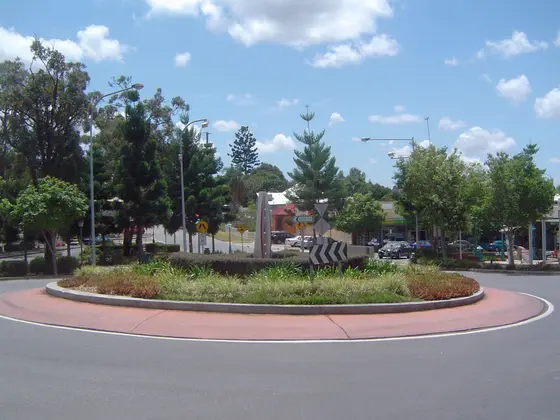 Photograph of Oxley central roundabout in Brisbane, Queensland, Australia showing landscaping done under the Brisbane City Council Suburban Community Improvemen